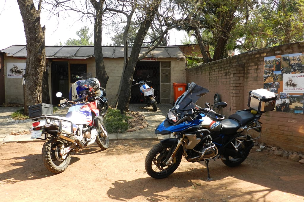 Adventure motorbikes in front of Dual Sport Adventure (DSA) Rustenburg maintenance shop.